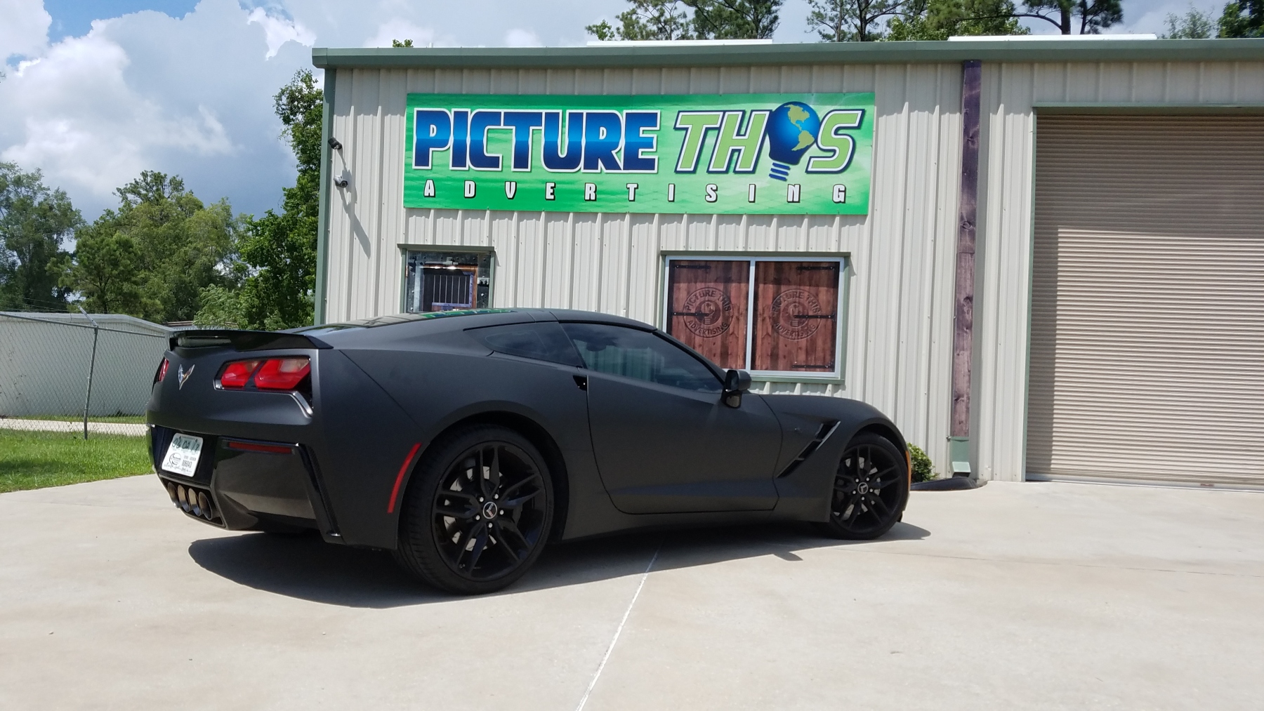 Corvette Stingray in a matte black color-change wrap