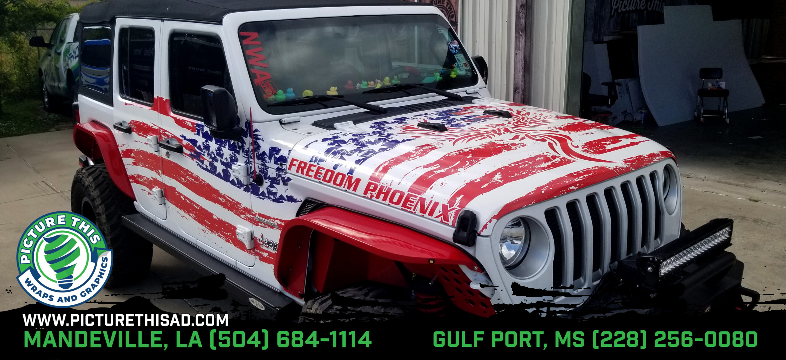 Freedom Phoenix Jeep with custom red white and blue printed wrap