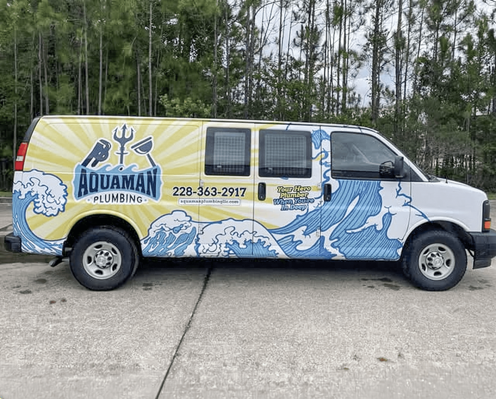 Aquaman Plumbing wave-themed service van wrap
