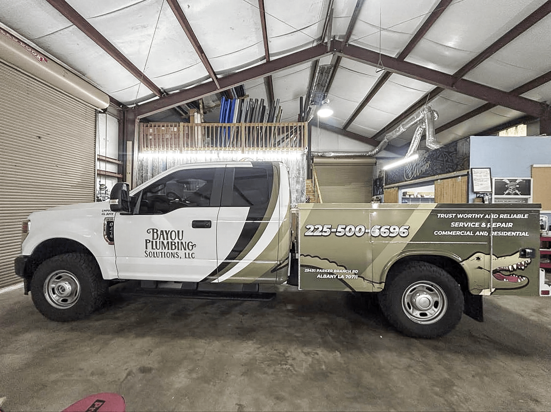 Bayou Plumbing utility service truck graphics