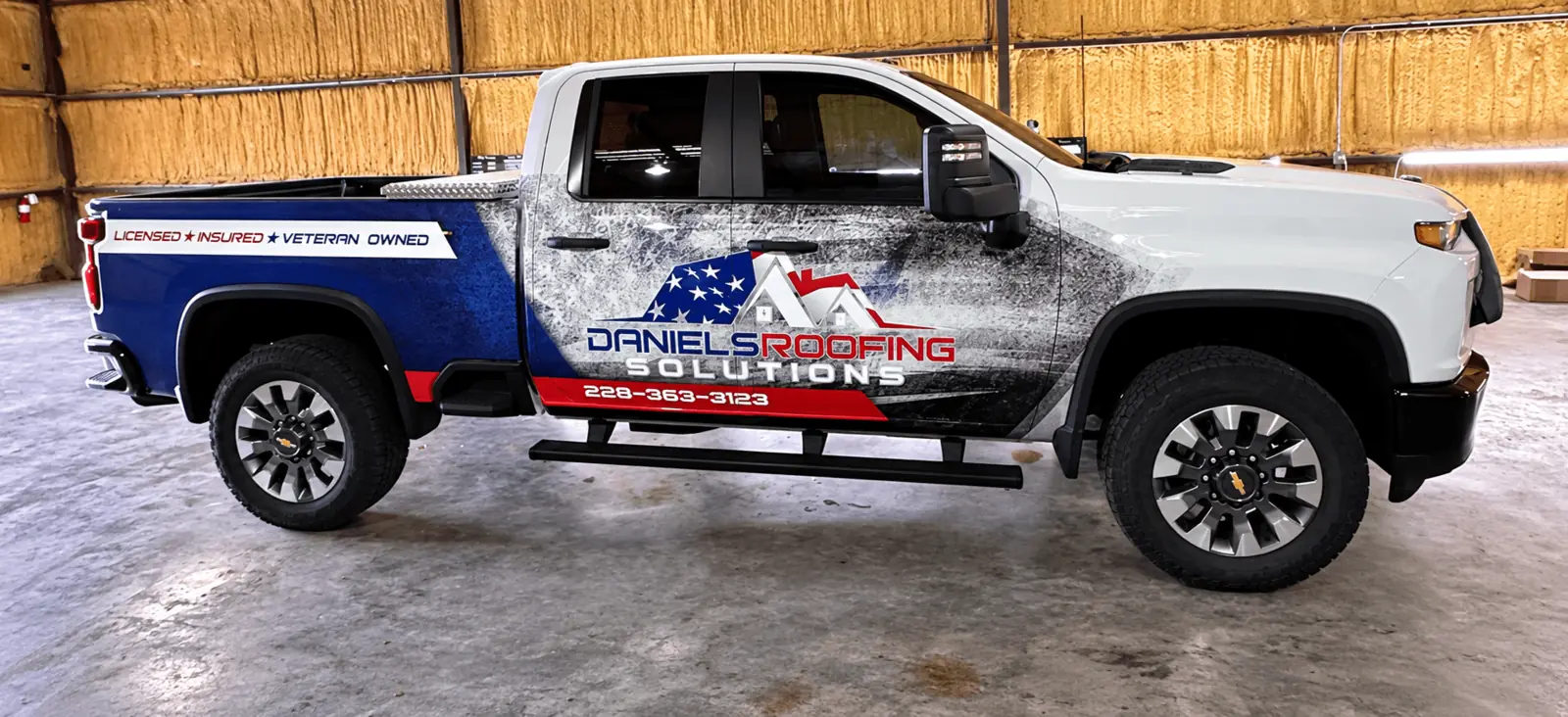 Daniels Roofing partial truck wrap