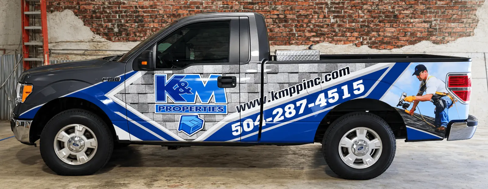 K&M Properties partial truck wrap