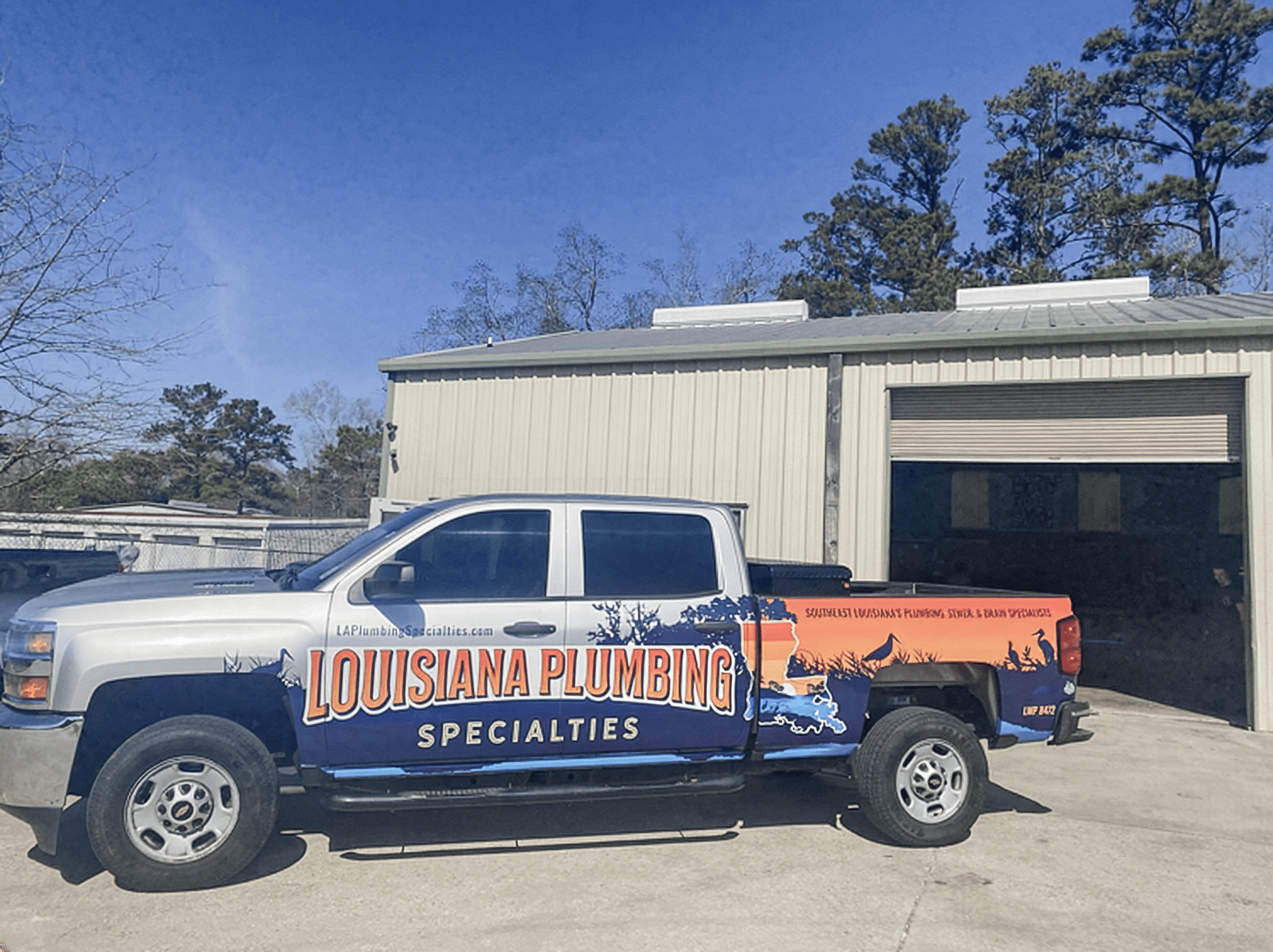 Louisiana Plumbing Specialties pickup truck wrap driver side