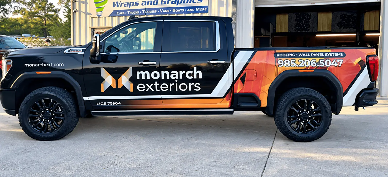 Monarch Exteriors reflective truck wrap