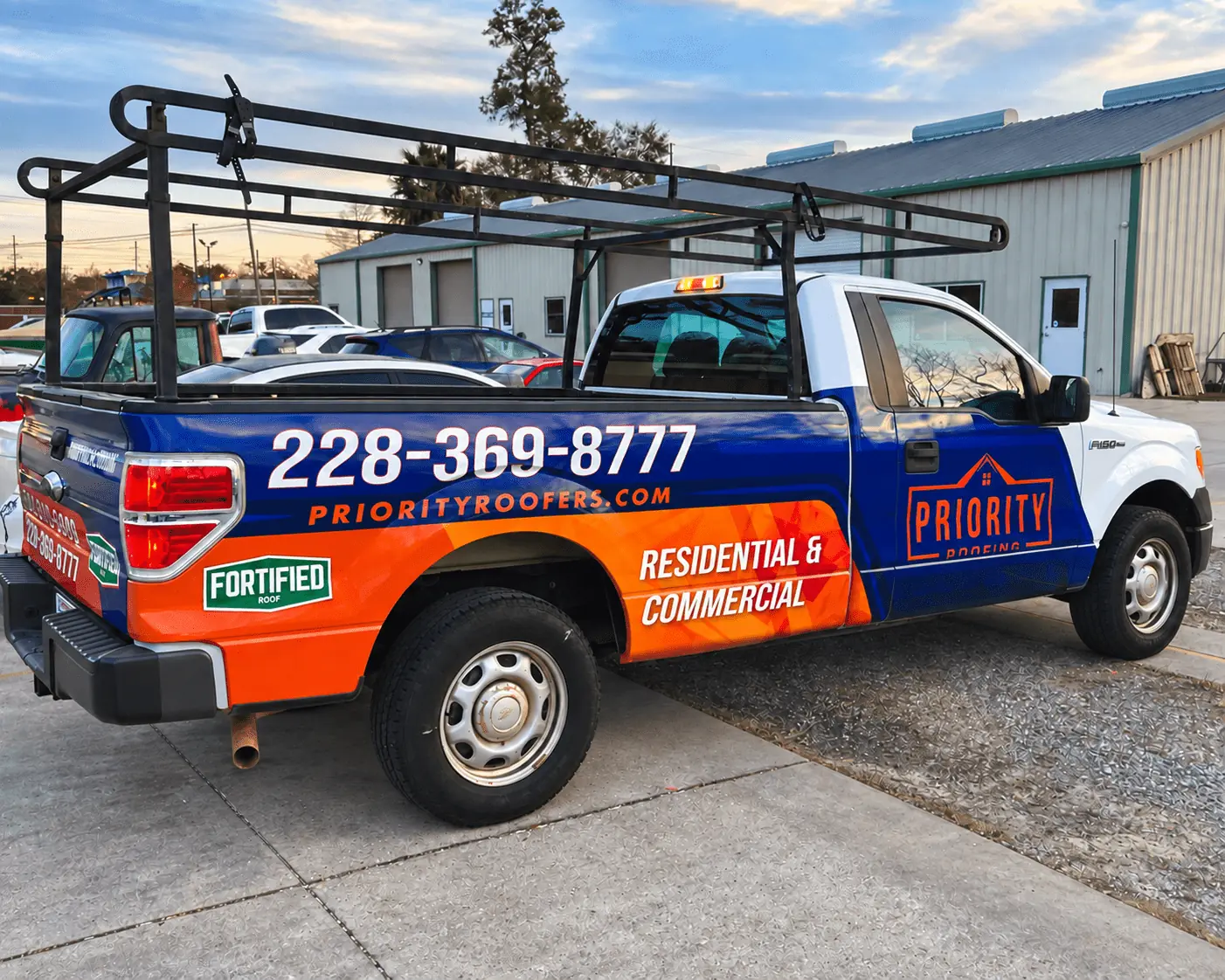Priority Roofing partial truck wrap