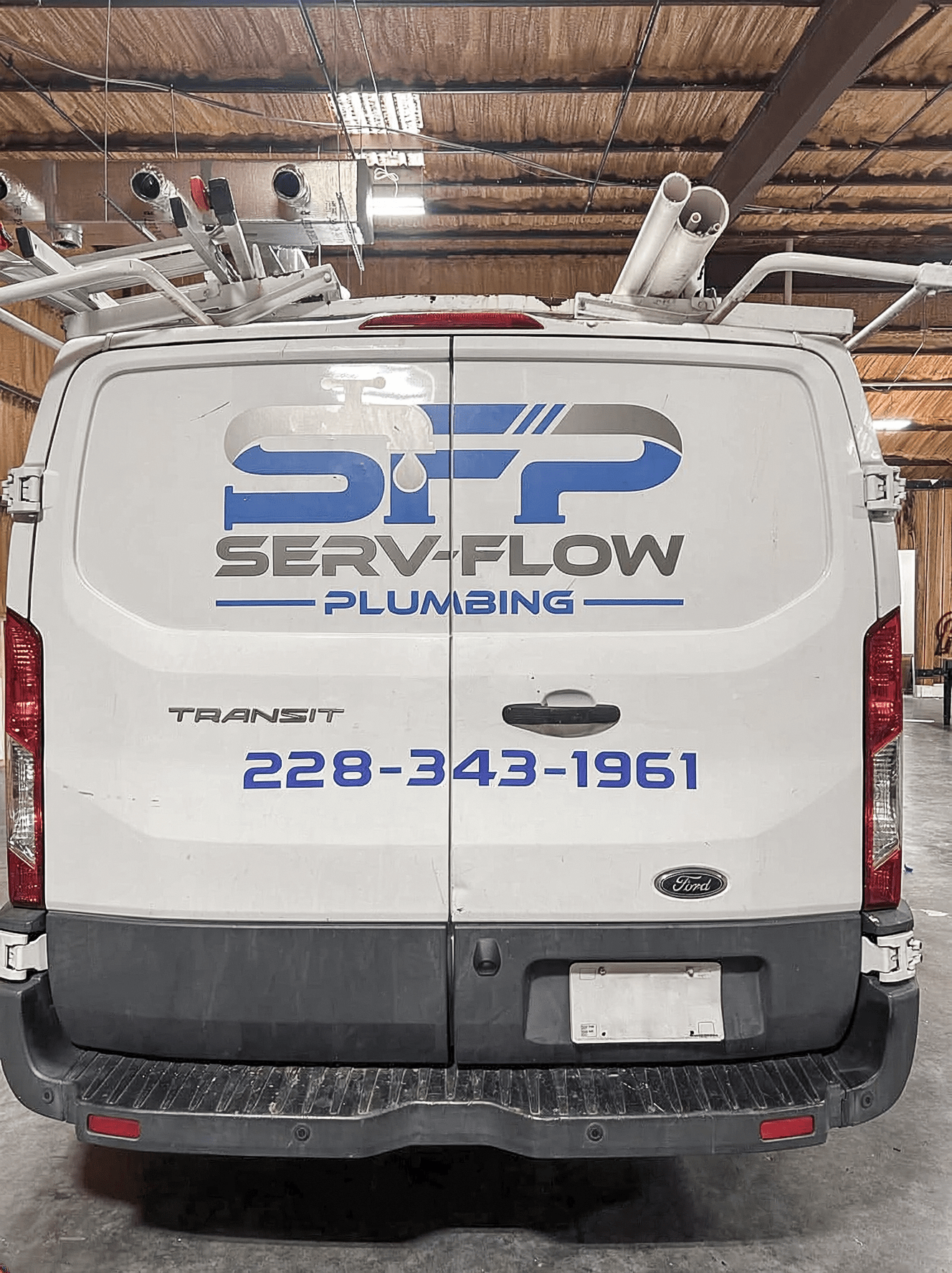 ServFlow Plumbing Ford Transit rear door graphics