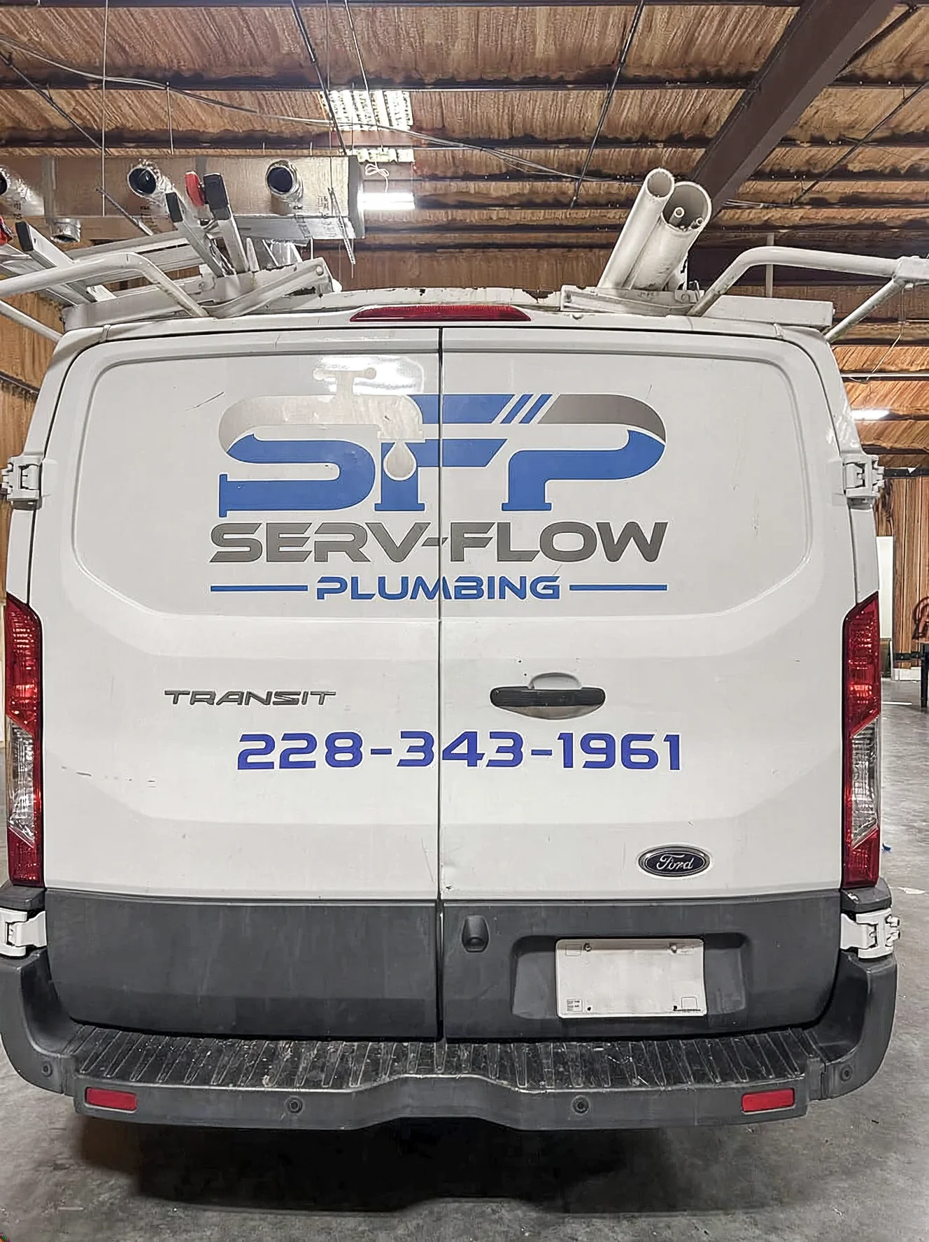 ServFlow Plumbing Ford Transit rear door graphics