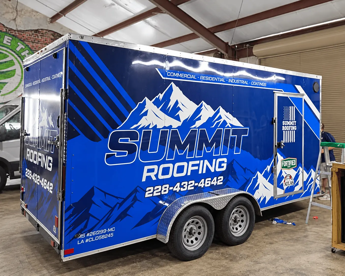 Summit Roofing enclosed trailer wrap