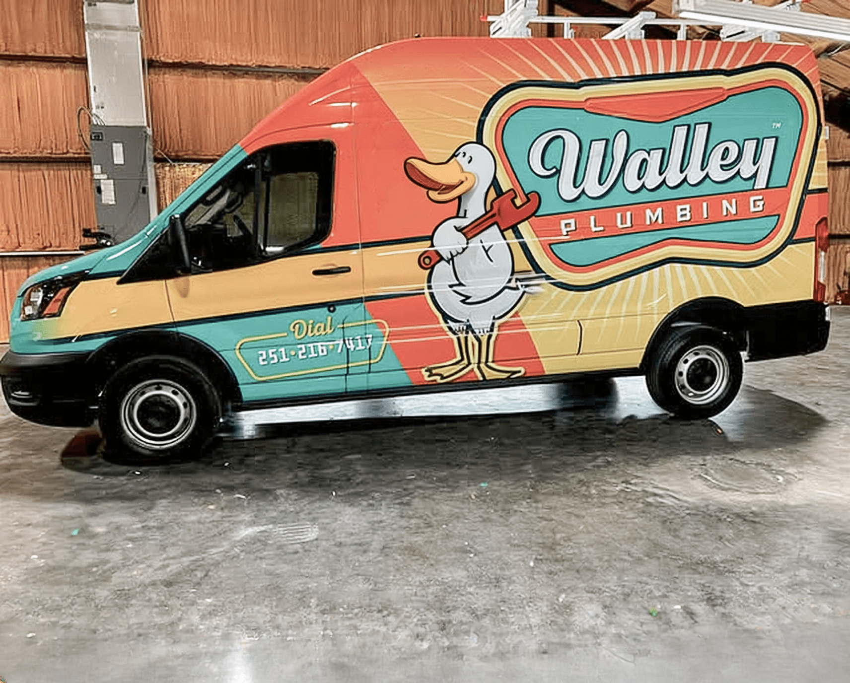 Walley Plumbing colorful full cargo van wrap