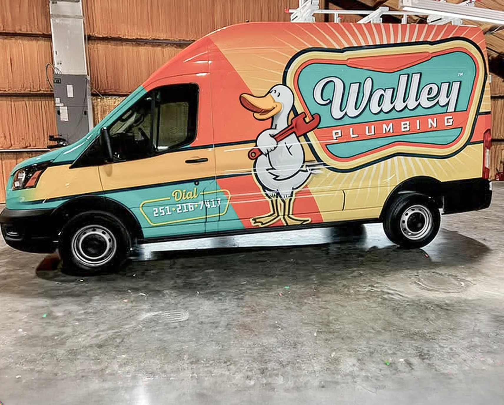 Walley Plumbing colorful full cargo van wrap