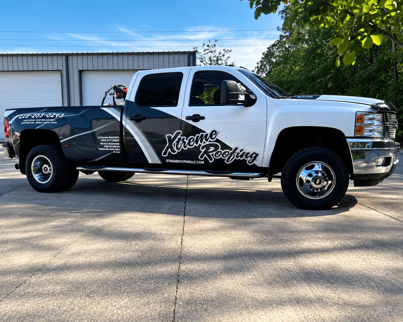 Xtreme Roofing dually truck wrap