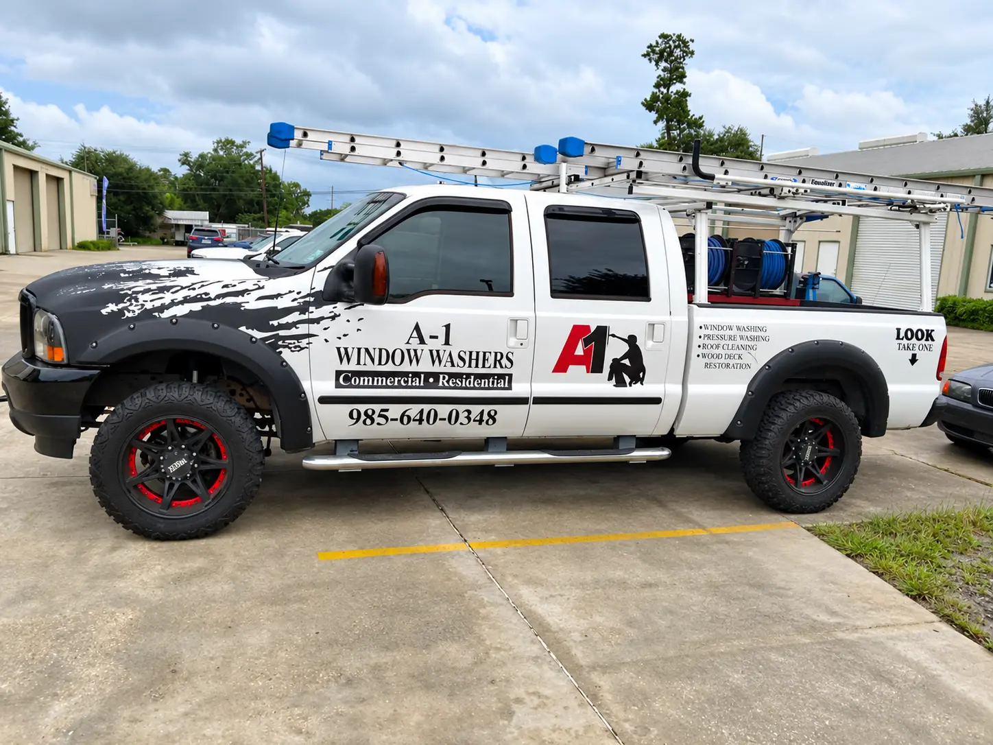 A1 Window Washers service truck wrap with ladder rack