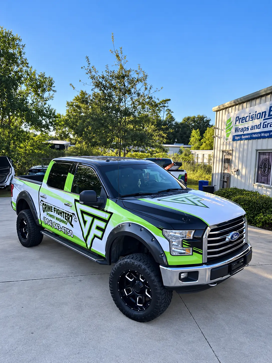 Grime Fighter green and black pressure washing pickup truck wrap