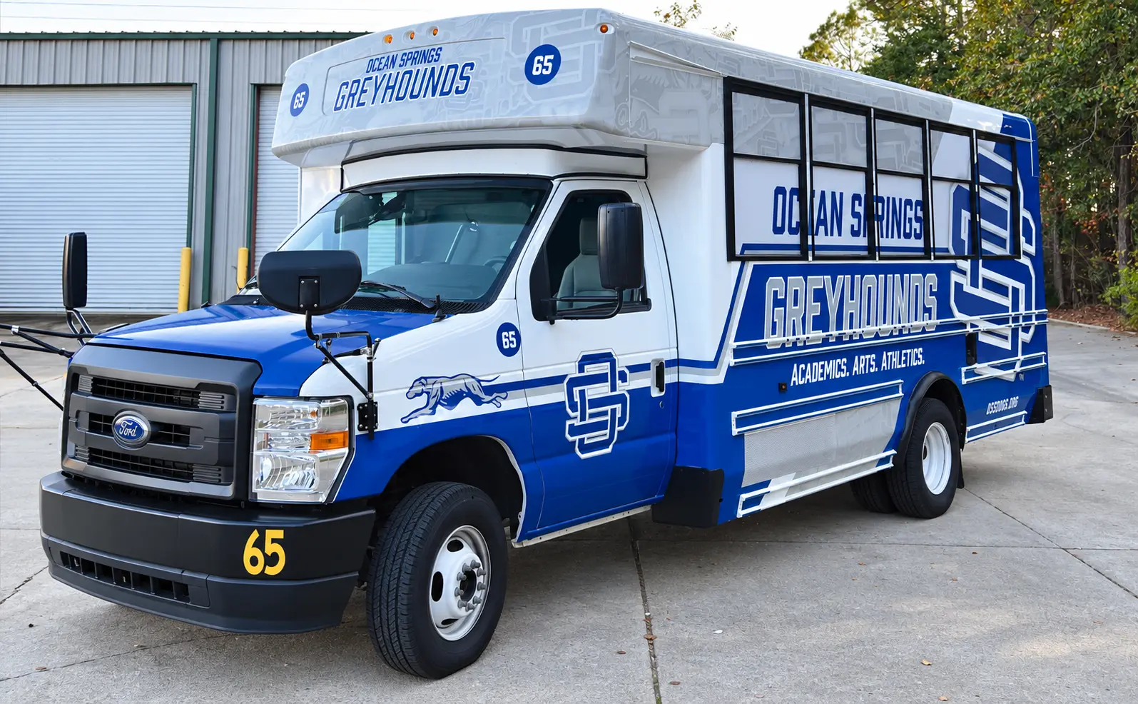 Ocean Springs Greyhounds school shuttle bus wrap