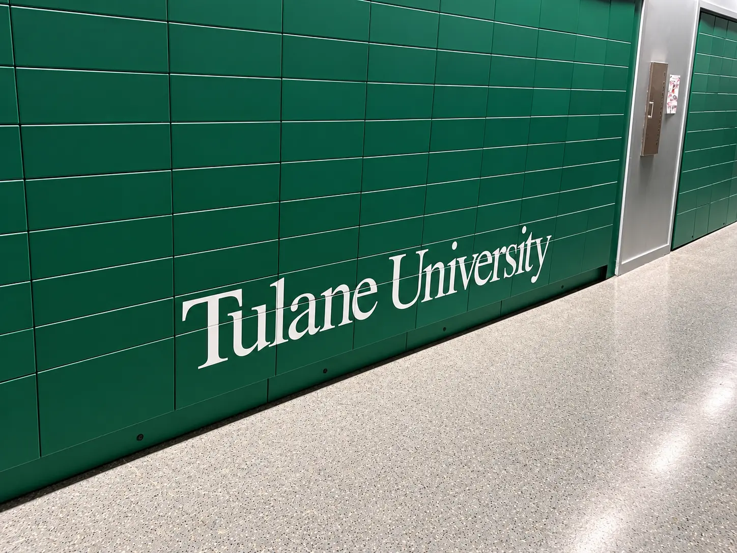 Tulane University green locker graphics with white wordmark