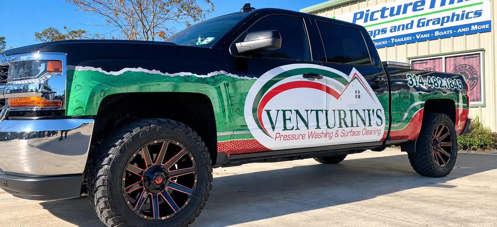 Venturini's pressure washing pickup truck wrap