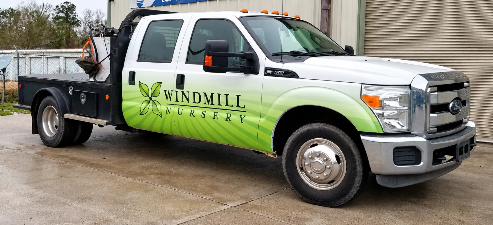 Windmill Nursery flatbed truck partial wrap