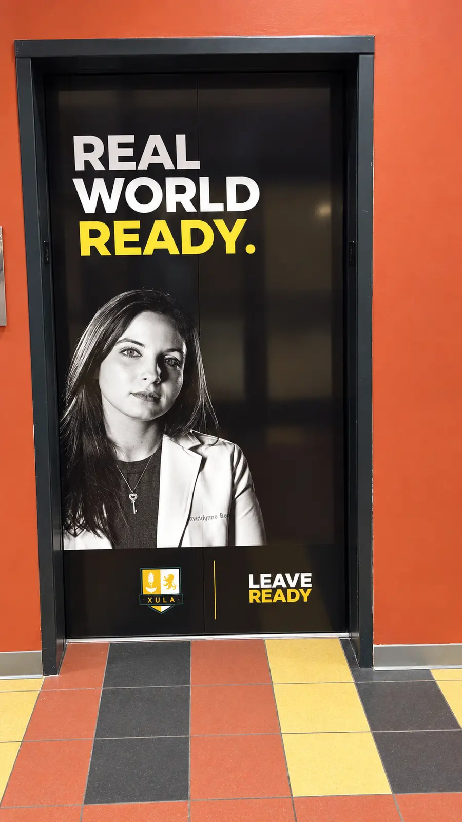 Xavier University Real World Ready elevator door wrap