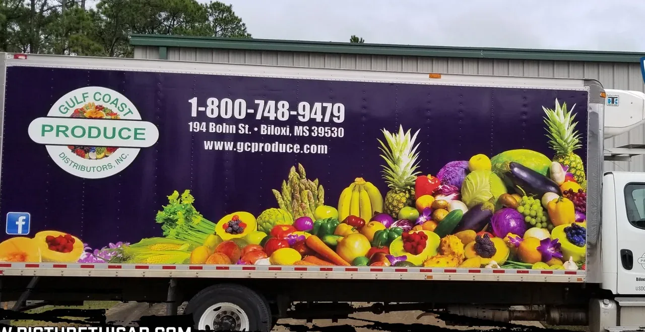 Gulf Coast Produce refrigerated box truck with fruit and vegetable vinyl graphics