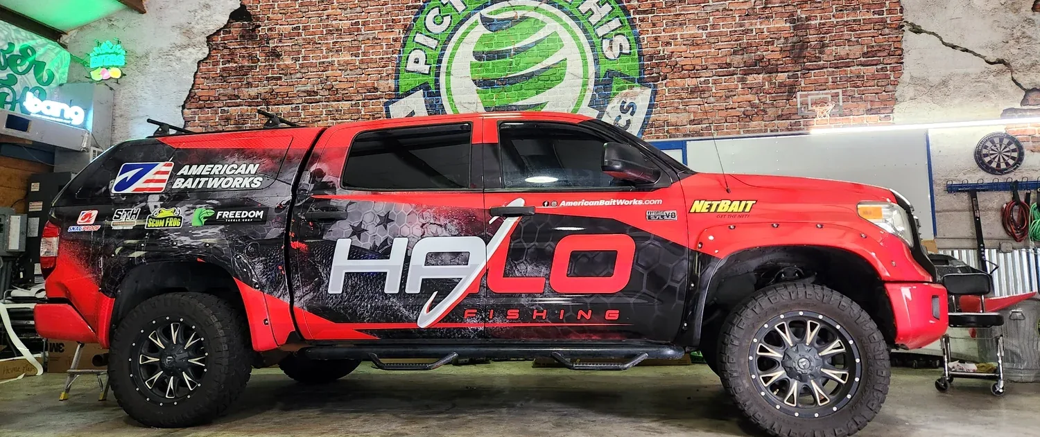 HALO Fishing wrapped red truck