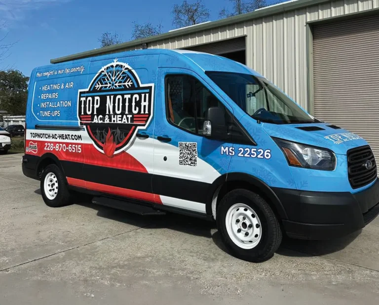 Blue commercial HVAC Transit van wrap with Top Notch AC and Heat branding